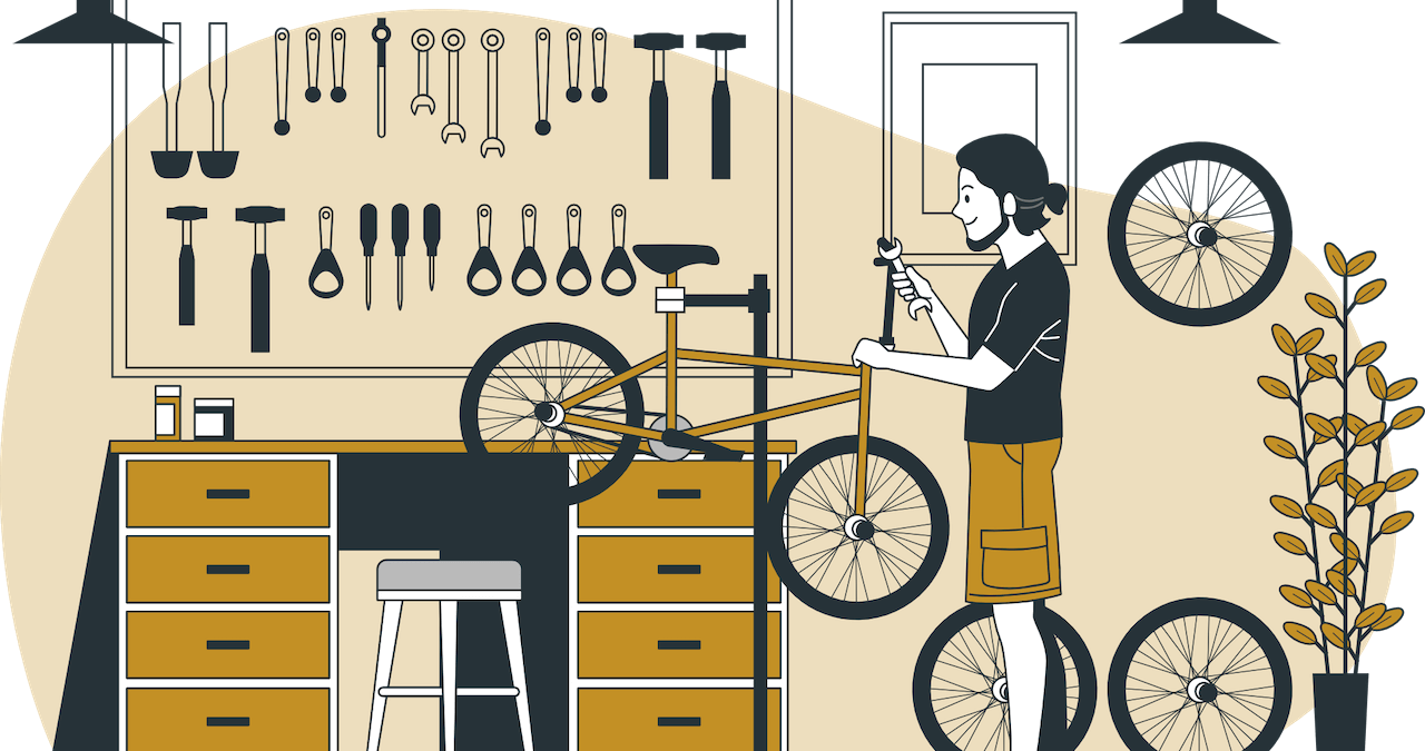 reparateur de vélo change une roue crevée